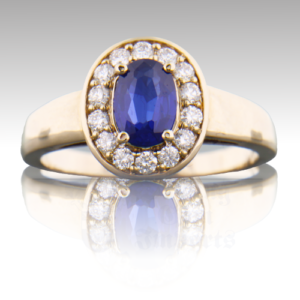 Sapphire .82ct Oval (.28ct Halo) 14K WG Ring FIN039